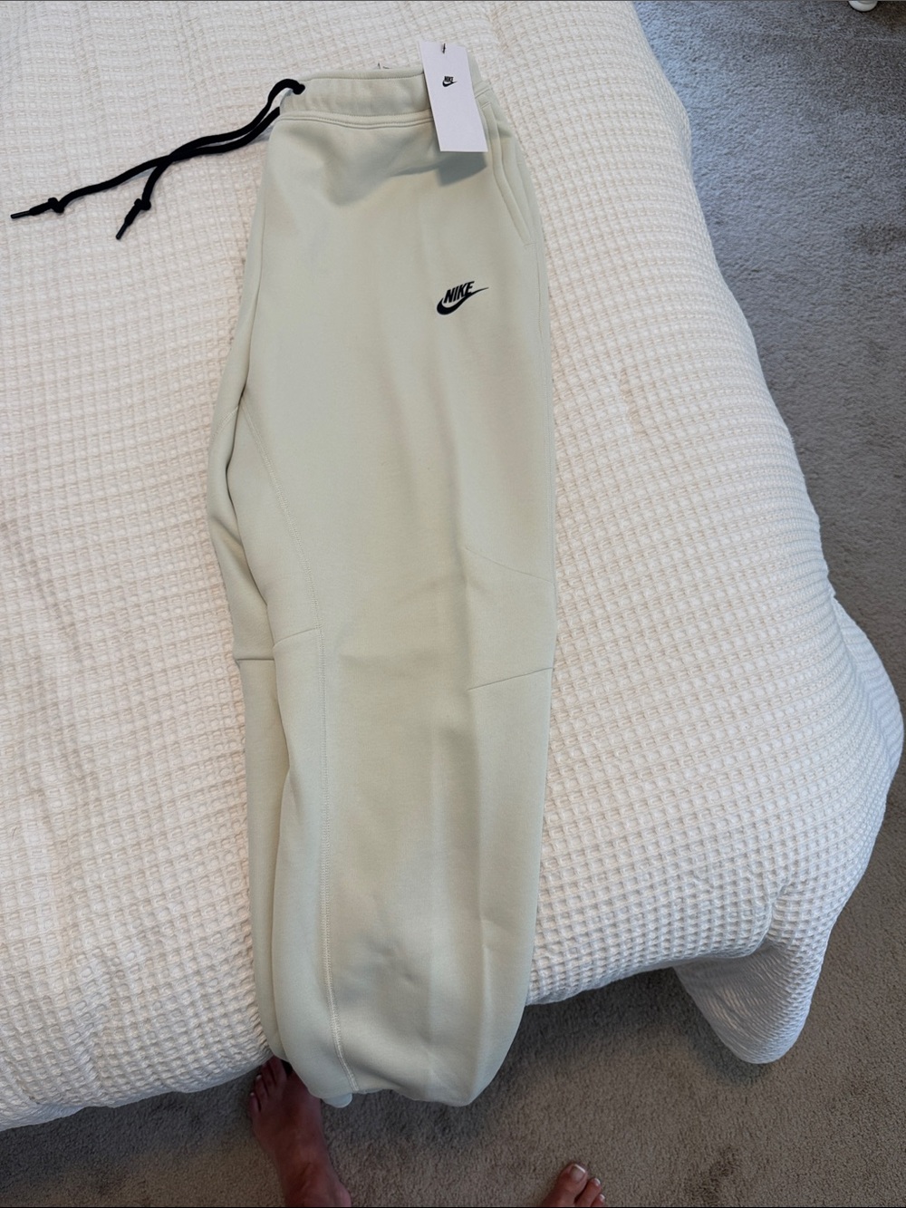 Nike Kids Light Cream Sweatpants with Black Logo and Drawstring